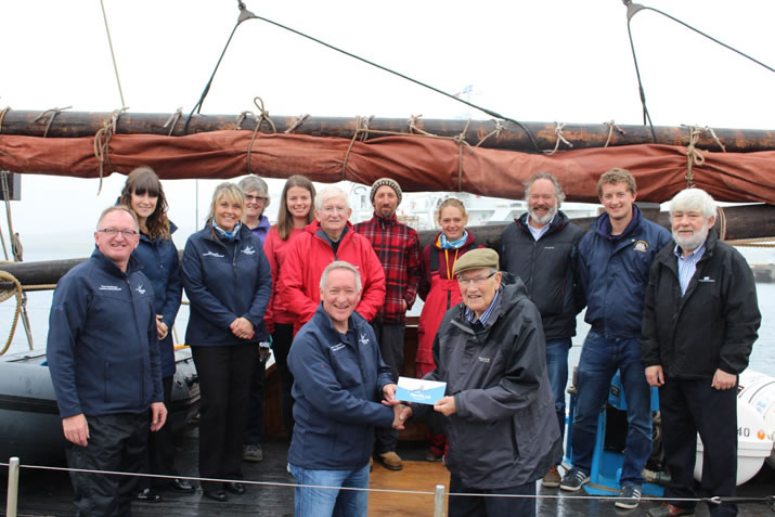 NorthLink present the Swan trust with a cheque