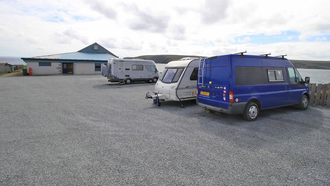 Fetlar Community hall with campers