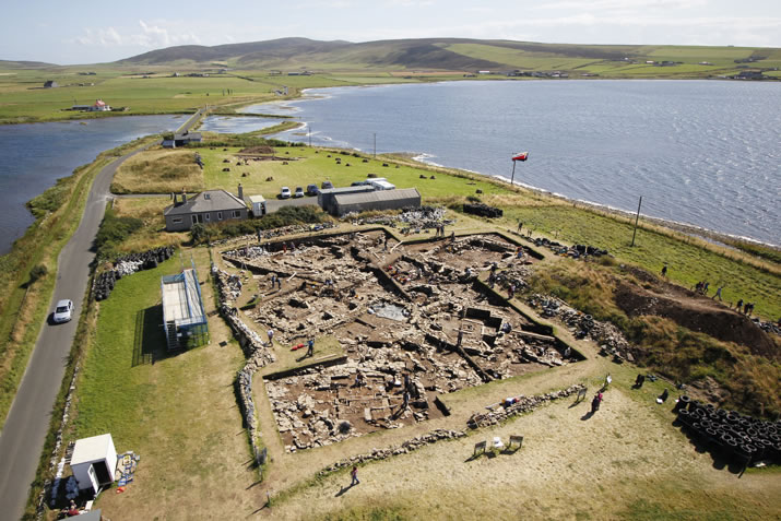 Overview of the main trench at the Ness of Brodgar looking south towards the Stones of Stenness, Orkney