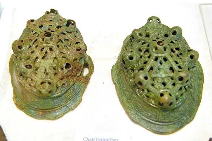 Viking brooches found in a grave at the Broch of Gurness