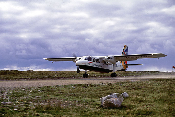 Plane landing on the airfield in Foula, Shetland