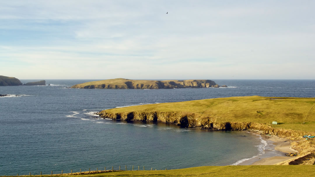 Muckle Sound with Rerwick bay, the island of Colsay, Cloki Stack and Fora Ness