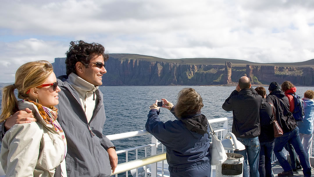 On the outside deck passing the Old Man of Hoy in Orkney.