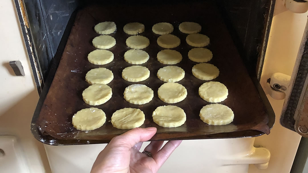 Putting Cheese Nibbles into the oven