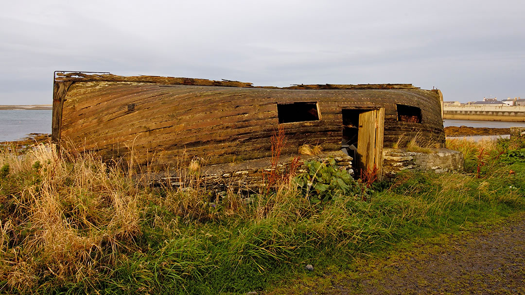 Shed with upturned lifeboat from SS Athenia, Whitehall, Stronsay, Orkney