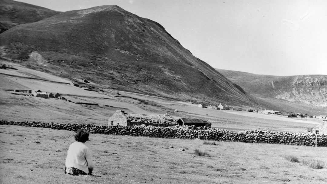 Looking up to Clicknafea and the school in Rackwick