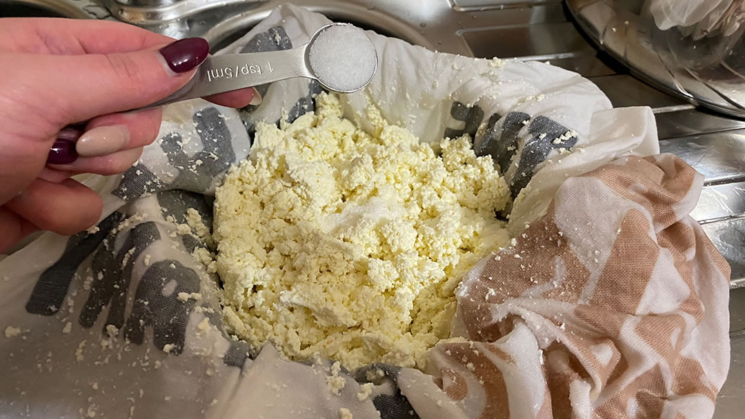 Adding salt to farmhouse cheese