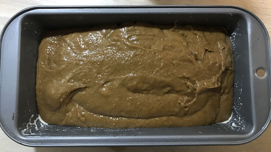 Gingerbread mixture in a baking tin