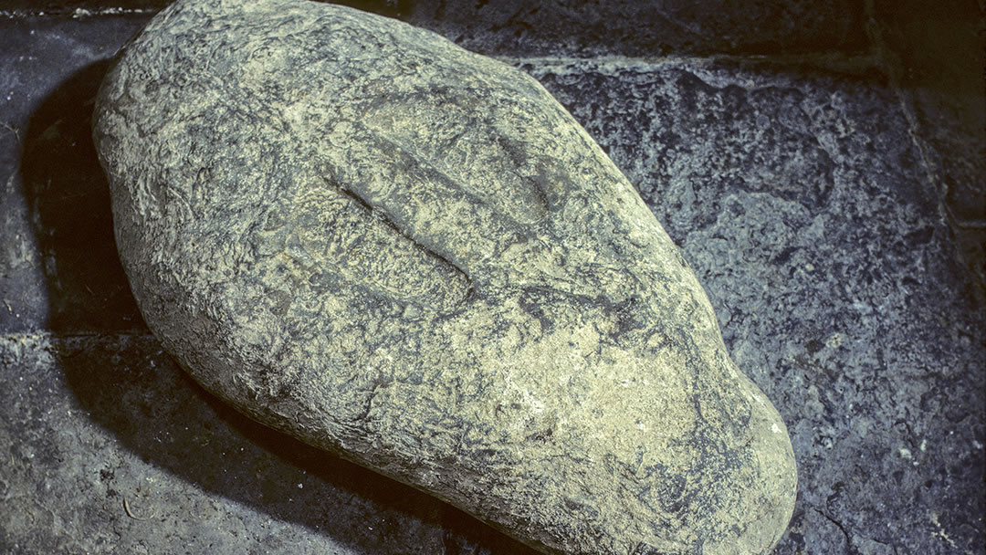 St Mary's Chapel stone with footprints, Burwick, South Ronaldsay, Orkney