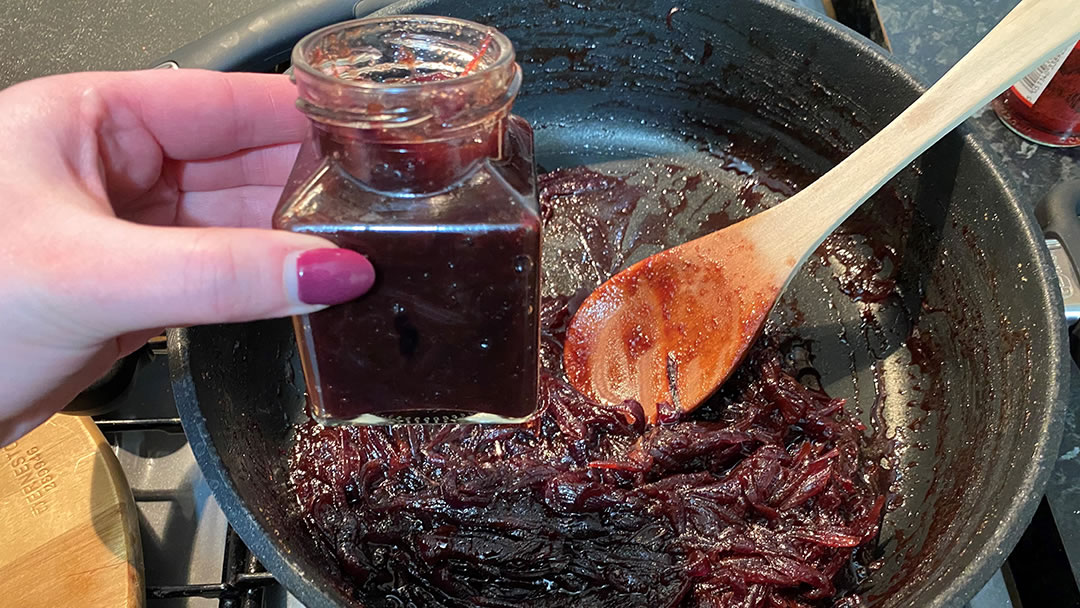 Spooning cooled chutney into jars