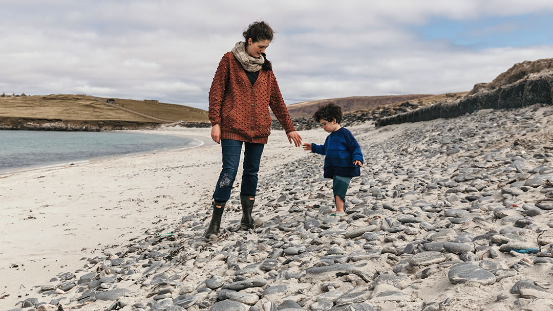 Family on Minn beach in West Burra, Shetland