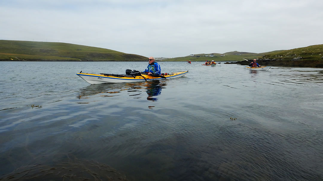 Paddling past Holm of Papil by Andy Waddington