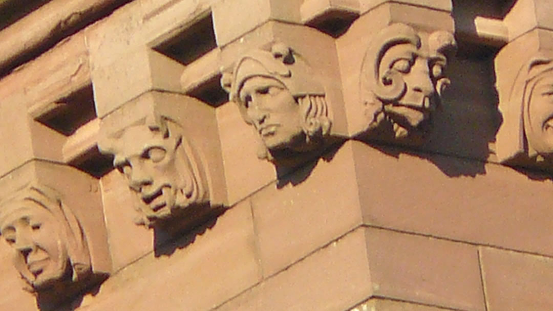 Faces on the outside of St Magnus Cathedral, Orkney