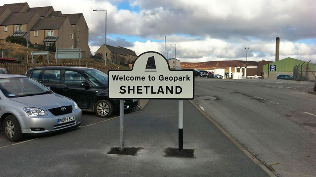 Shetland UNESCO Global Geopark sign at the NorthLink Lerwick Terminal