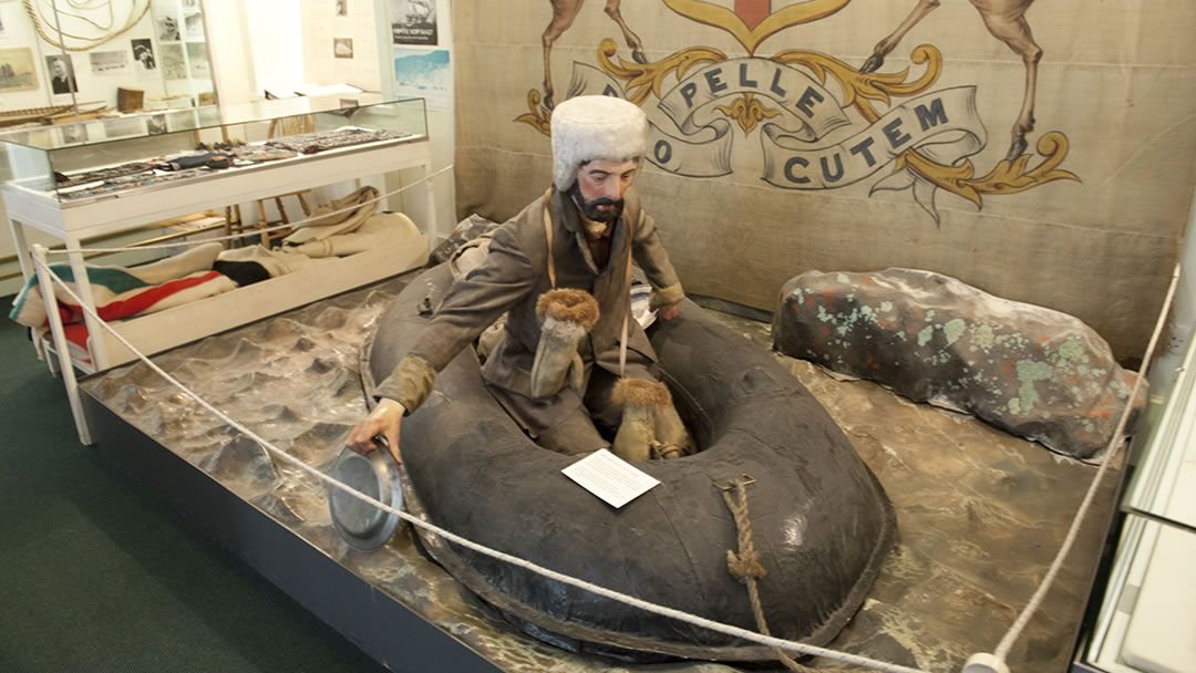 A display in the Stromness museum showing John Rae in a cloth boat