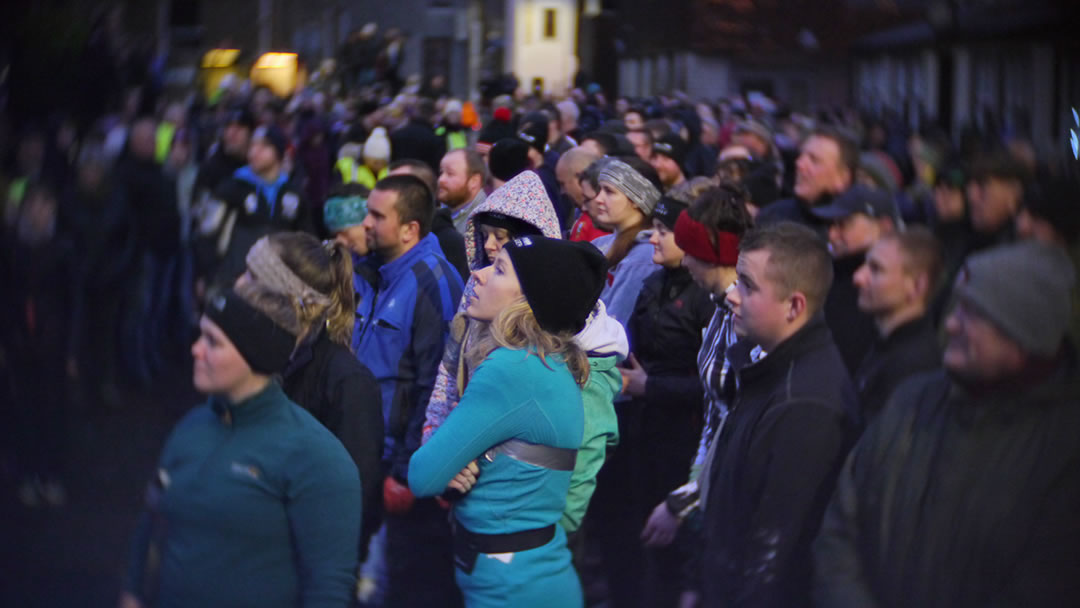 Onlookers at the Stromness Yule Log pull in 2018