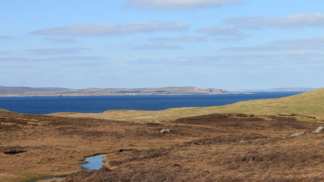 Views across to Burravoe, Yell.