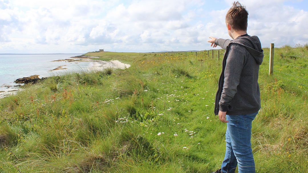 Walking along Egilsay's coast