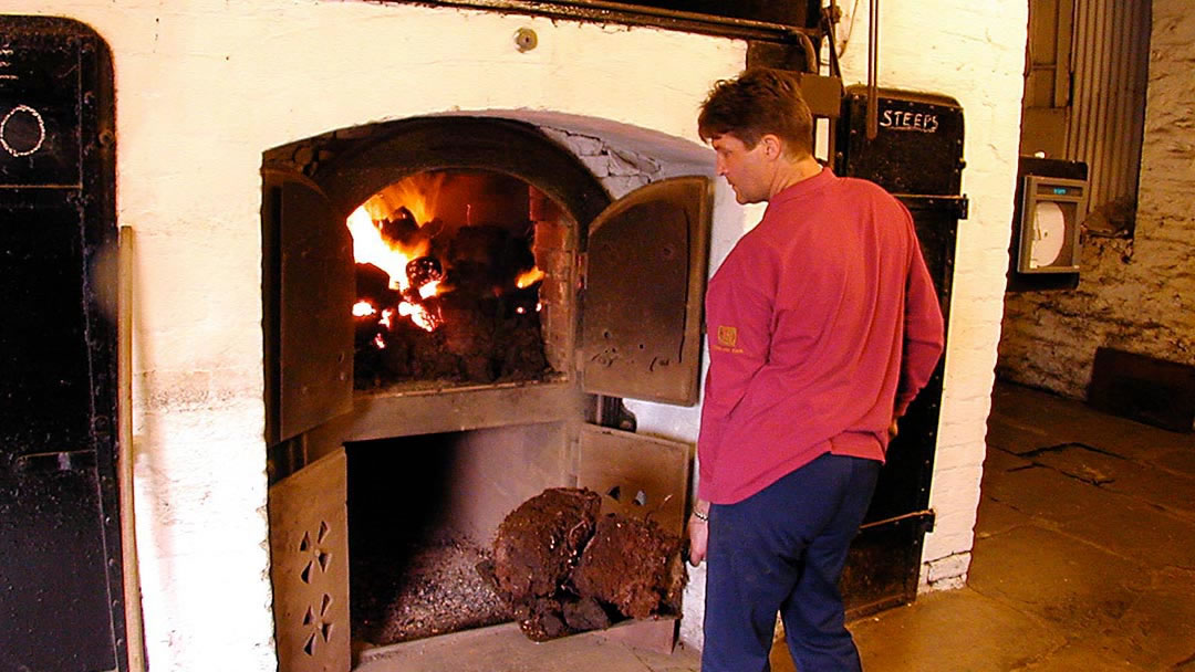 Peat fire in a whisky distillery