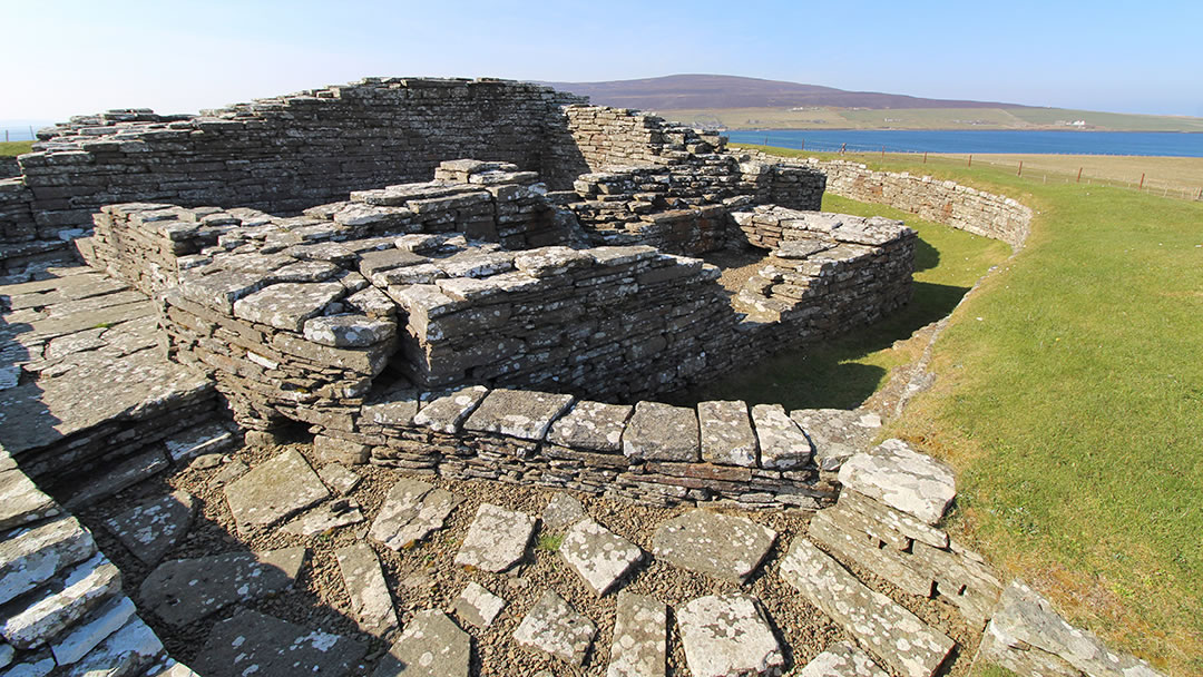 Cubbie Roo's Castle on the Orkney island of Wyre, with Rousay in the distance