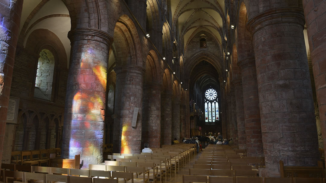 St Magnus Cathedral, with a stained glass reflection, Kirkwall, Orkney