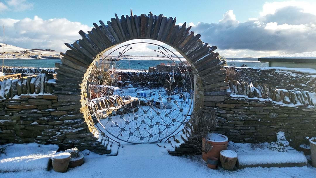 The moon gate and geranium garden