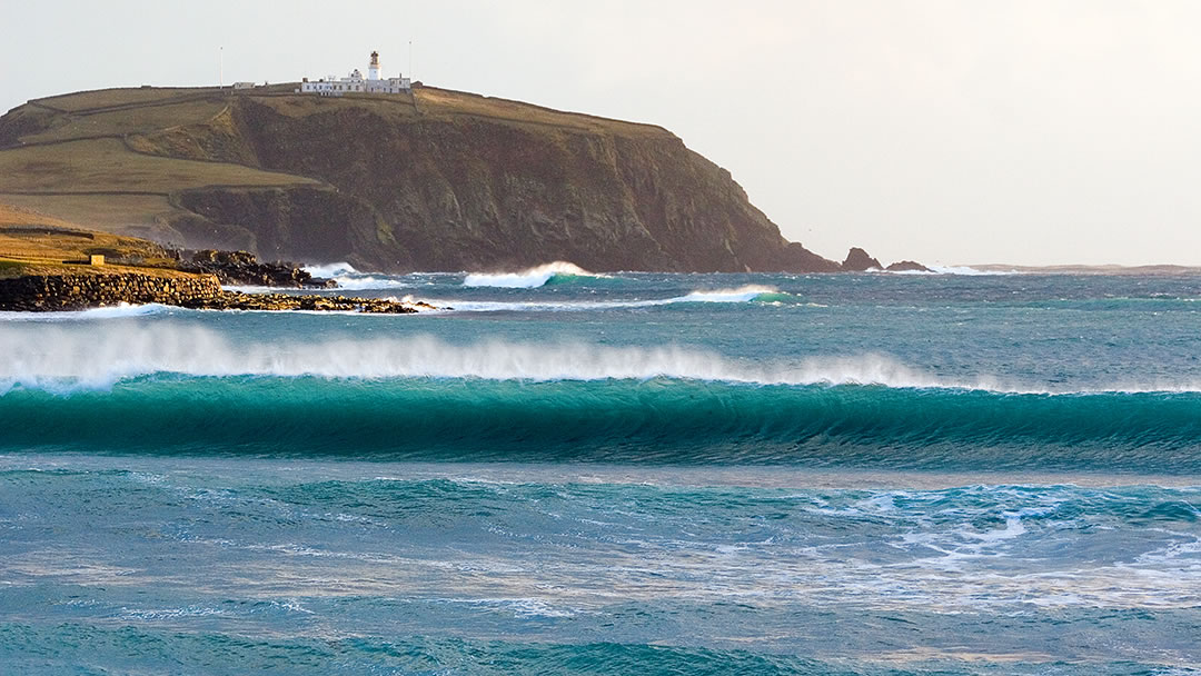 Sumburgh lighthouse in Shetland at sunset