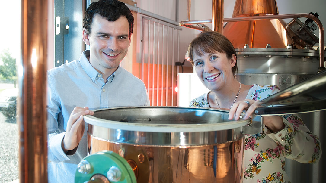 Martin and Claire with their still at Dunnet Bay Distillery in Caithness