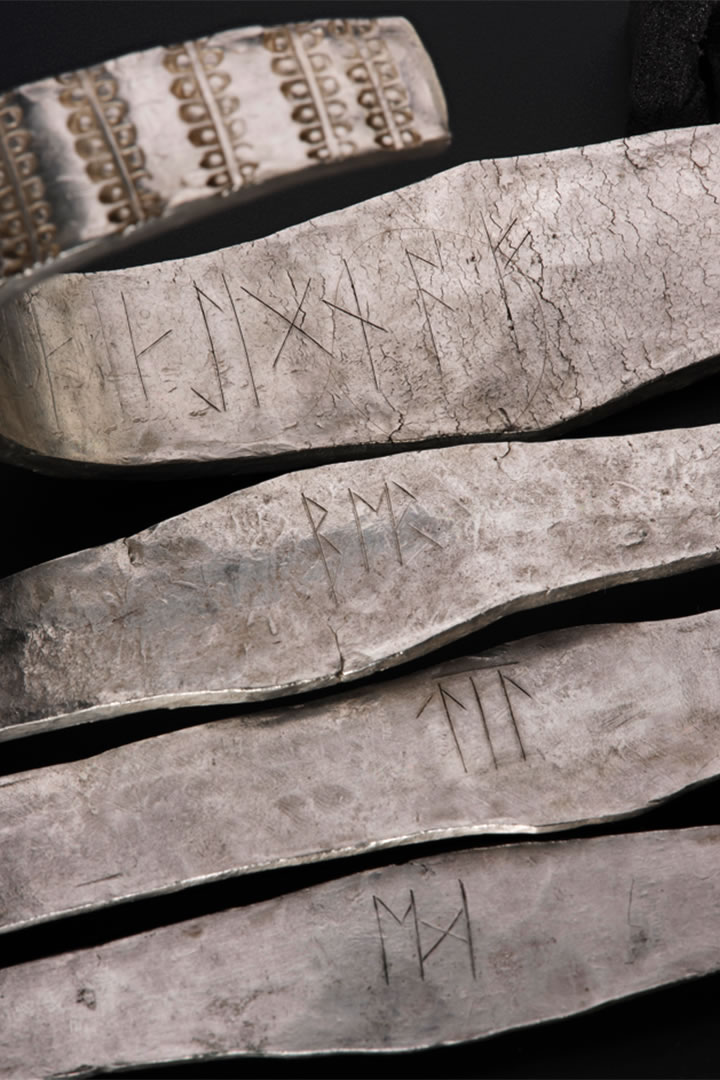 4 runic inscribed arm-rings