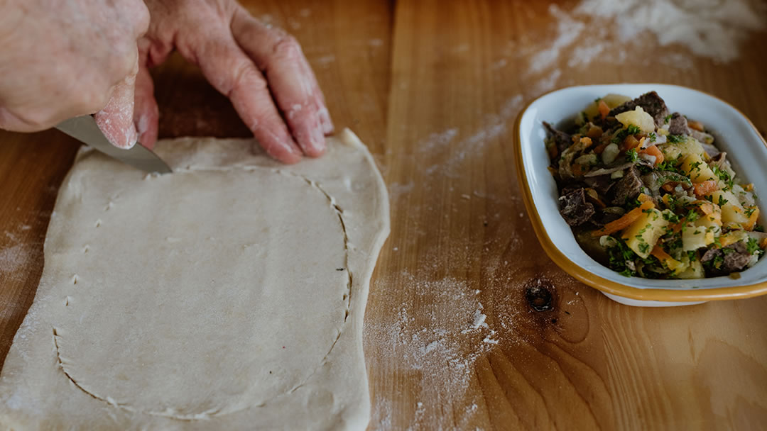 Cutting out the pastry for Reestit Mutton Pie