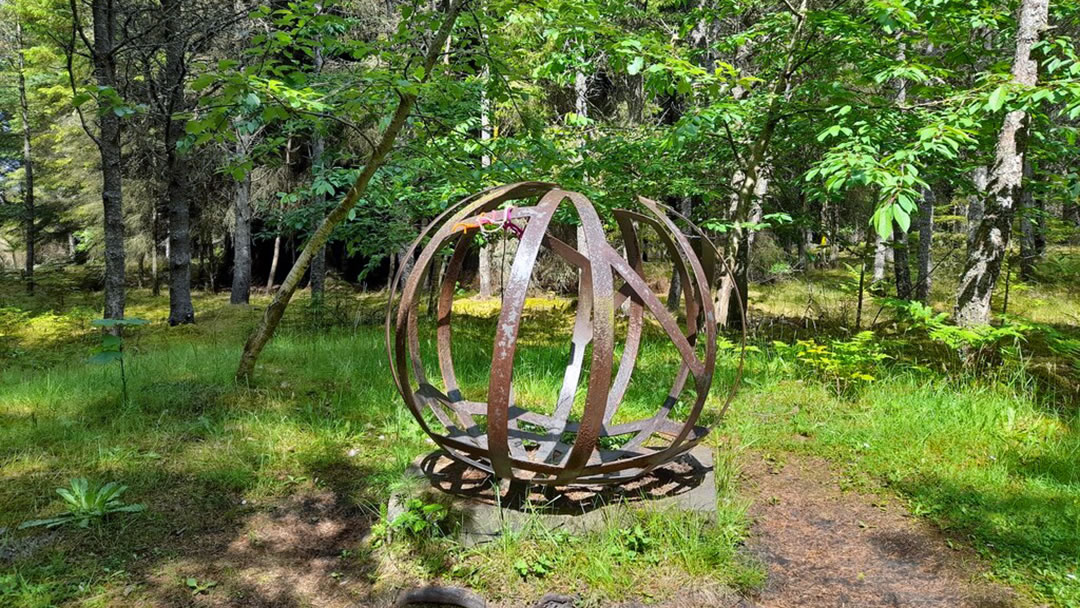 Flower of Olrig - a sculpture by Tamara Hicks in Dunnet Forest