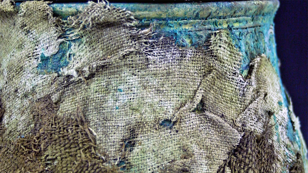 Detail of textiles wrapping the lidded vessel from the Galloway Hoard