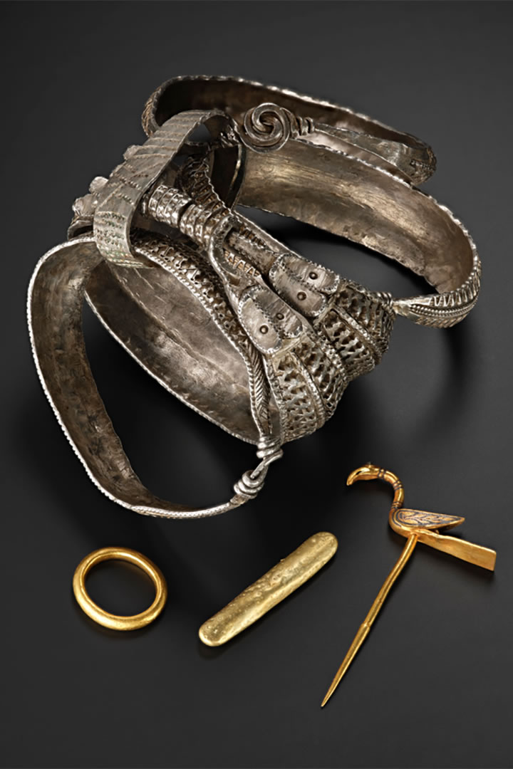 Four arm rings and gold objects from the Galloway Hoard