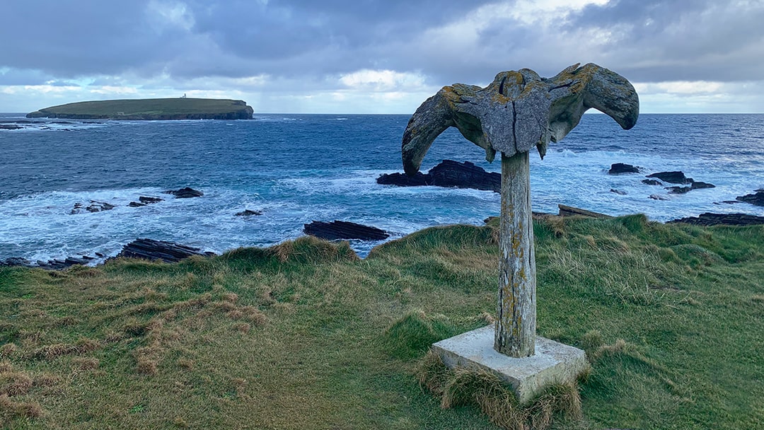 Birsay Whalebone overlooking the Brough of Birsay in Orkney
