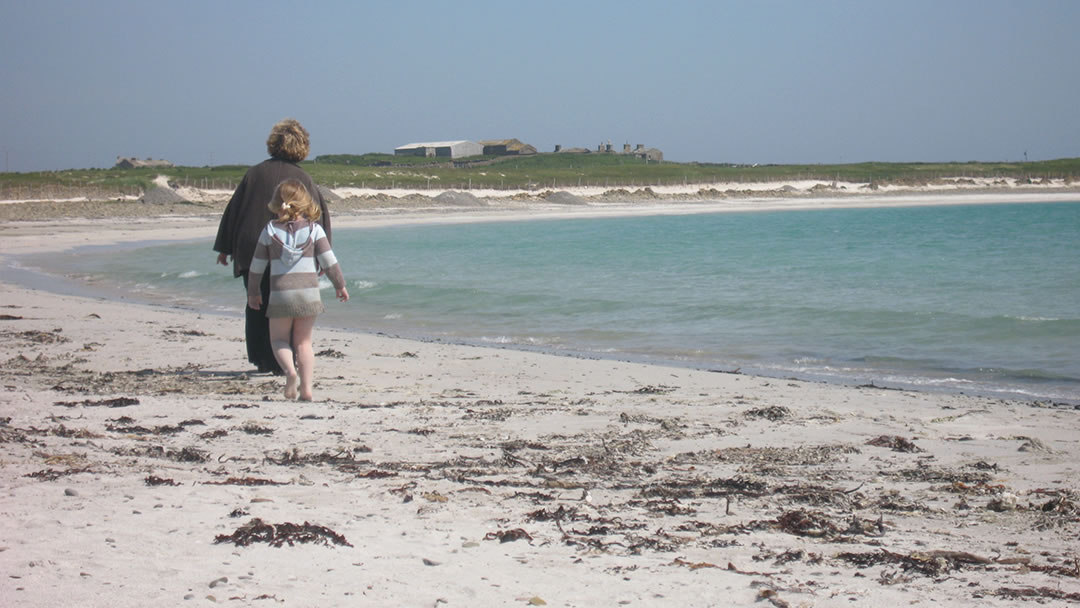 Milly and her Granny on a North Ronaldsay beach, Orkney