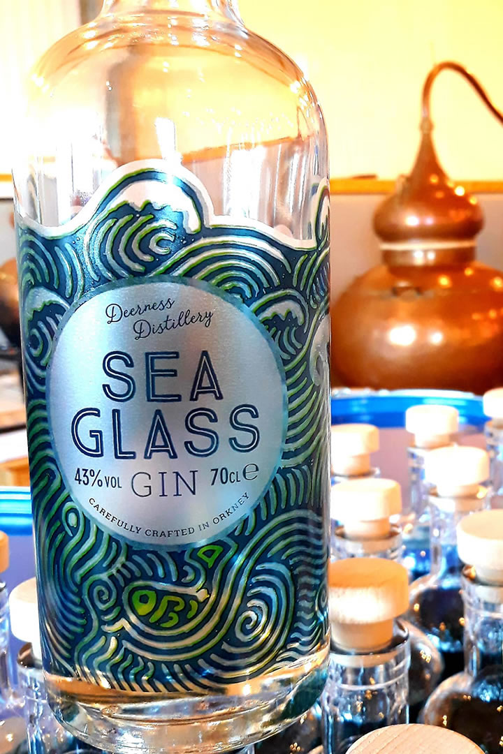 Sea Glass gin bottles and still
