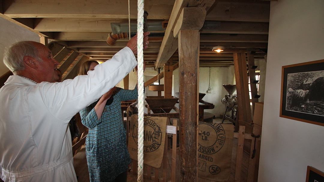 Pulling levers in the Barony Mill, Orkney 