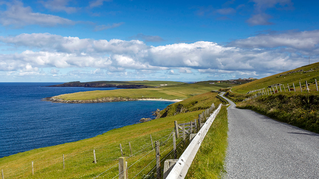 Single lane road along Shetland Coast photo