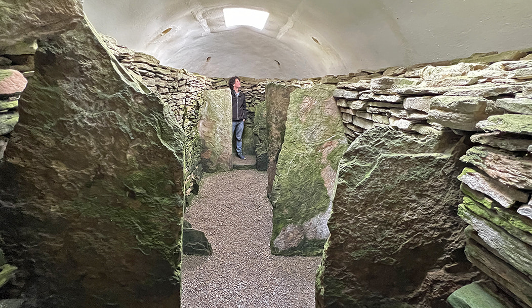 Exploring the inside of Unstan chambered cairn