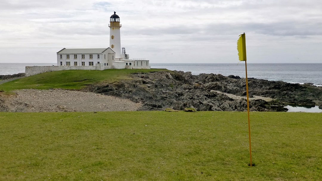 Fair Isle Golf Course overlooking Fair Isle South Lighthouse photo
