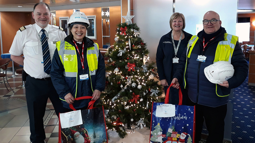 From left: Graeme Clark (Hotel Director), Josephine (Seafarers Volunteer), Fiona Anderson (Customer Service Manager) and Steve (Port Chaplin) on board the MV Hjaltland photo