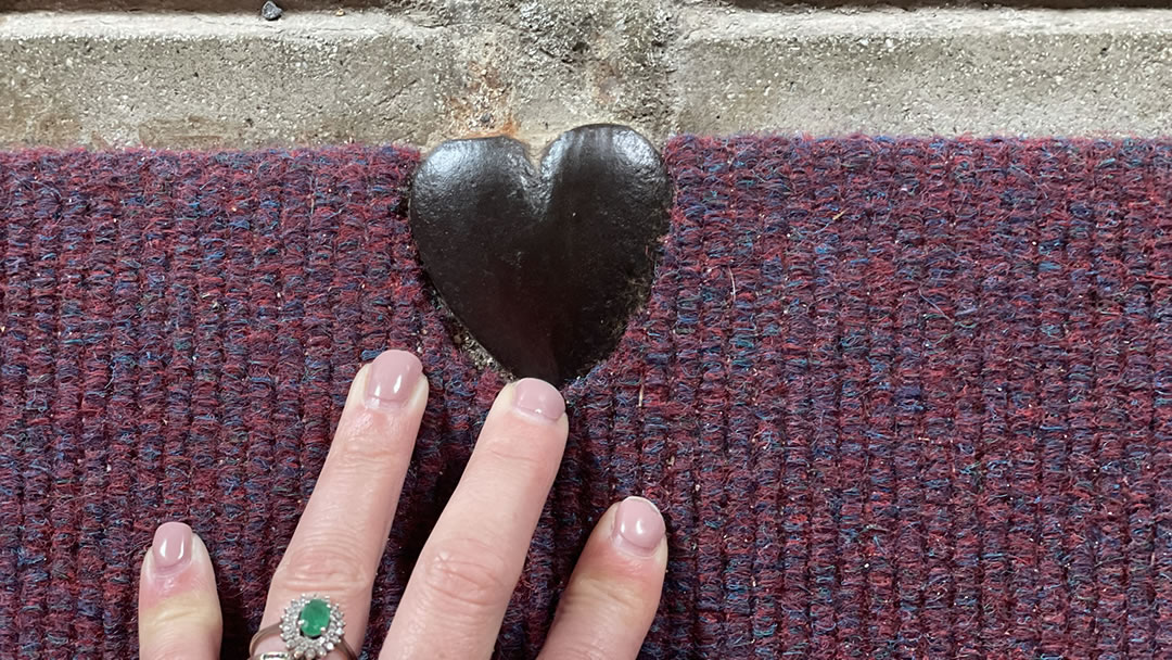 The heart left by a metal worker in the floor of the Italian Chapel
