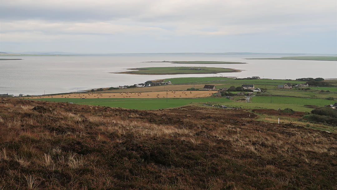 The view of Grimbister and Damsay from Cuween Hill Chambered Cairn