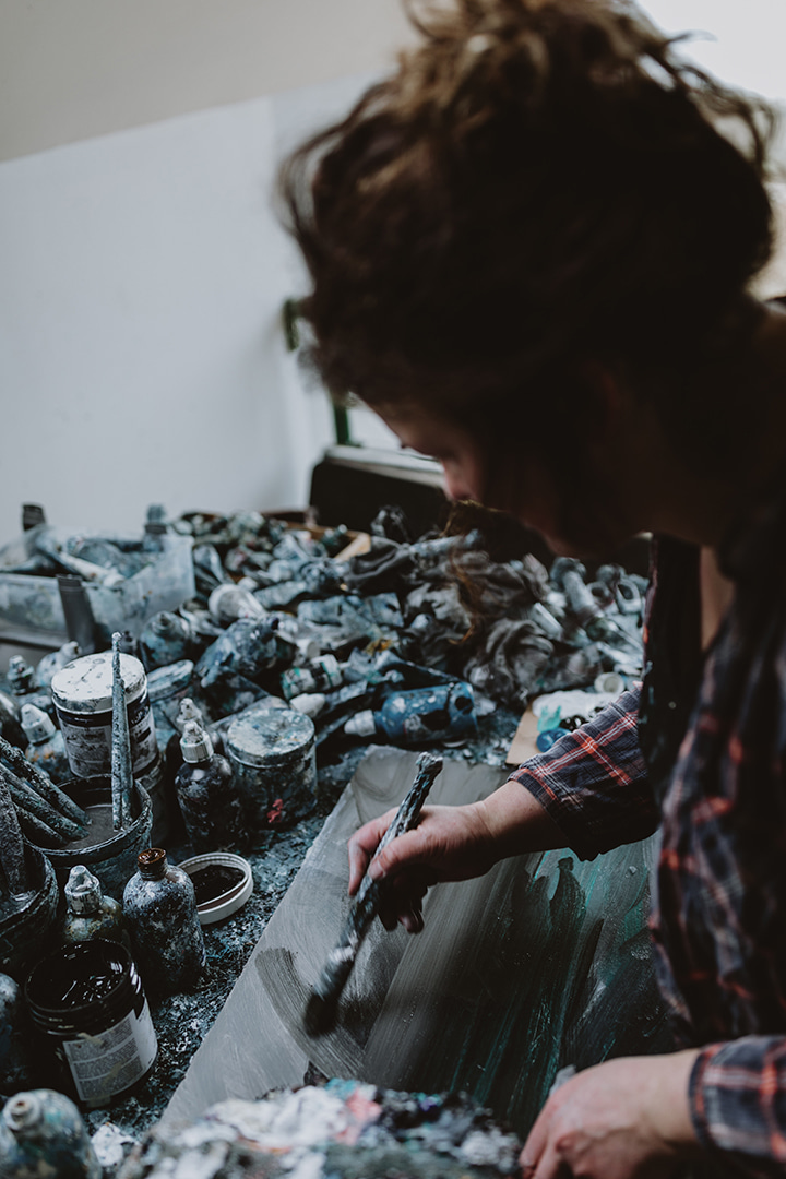 Ruth Brownlee painting in her Studio