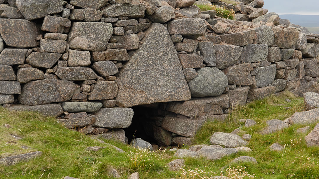 The red granite of Culswick Broch in Shetland