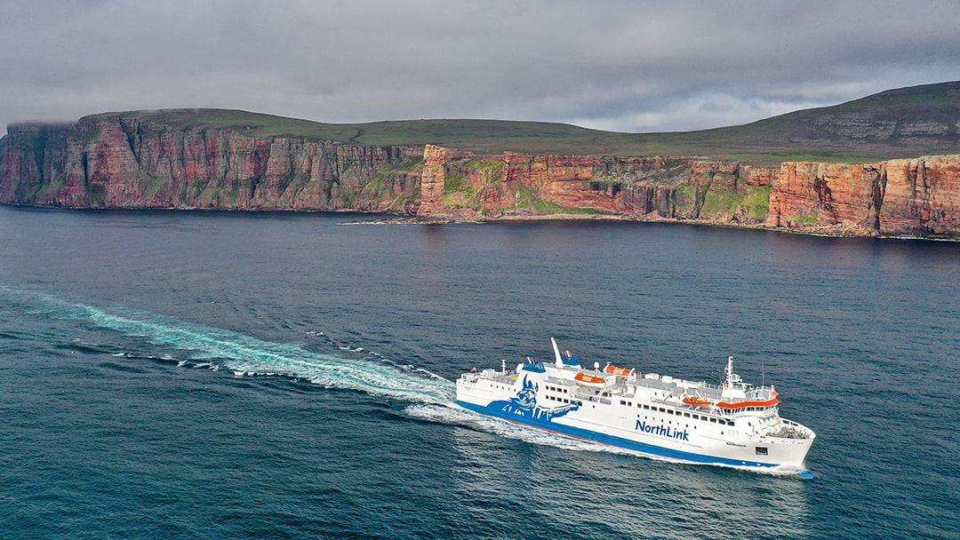 MV Hamnavoe sailing past the Old Man of Hoy heading to Stromness, Orkney