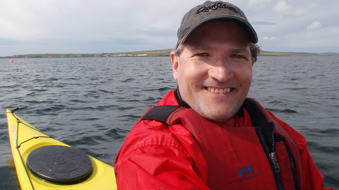 Robin kayaking in Orkney