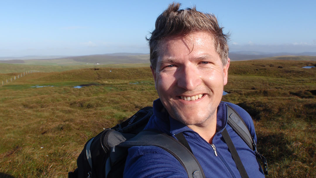 Hiking across the beautiful Shetland landscape