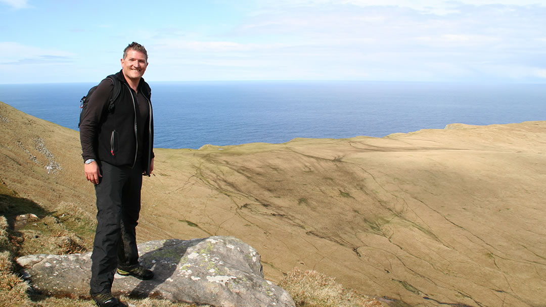 Robin hiking on the Shetland island of Foula
