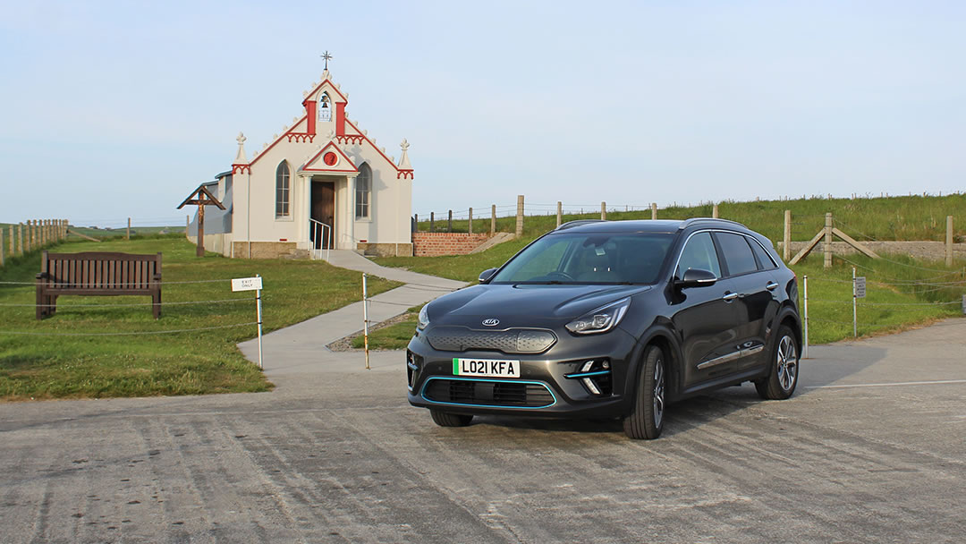 A Kia e-Niro at the Italian Chapel in Orkney